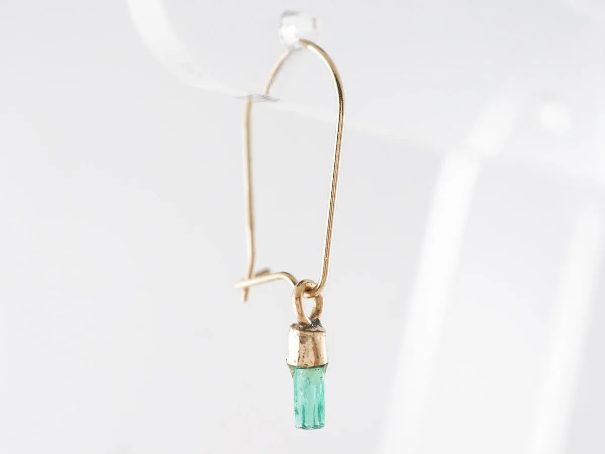 Delicate Emerald Dangle Earrings in 14k Yellow Gold