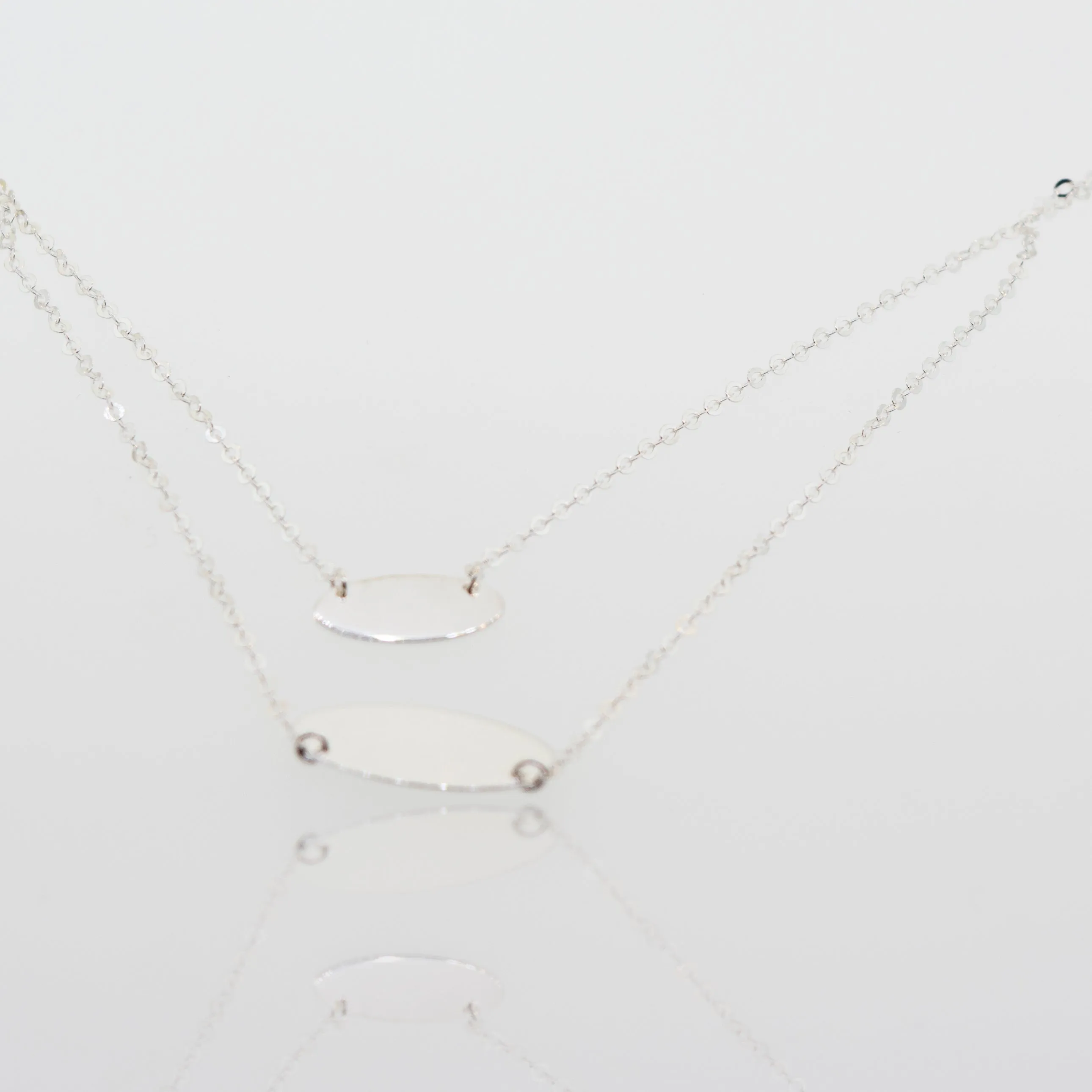 Elegant Sterling Silver Necklace with Two Oval Discs Pendants